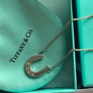 Tiffany and Co. Lucky horseshoe.  Sterling silver.  Authentic pouch